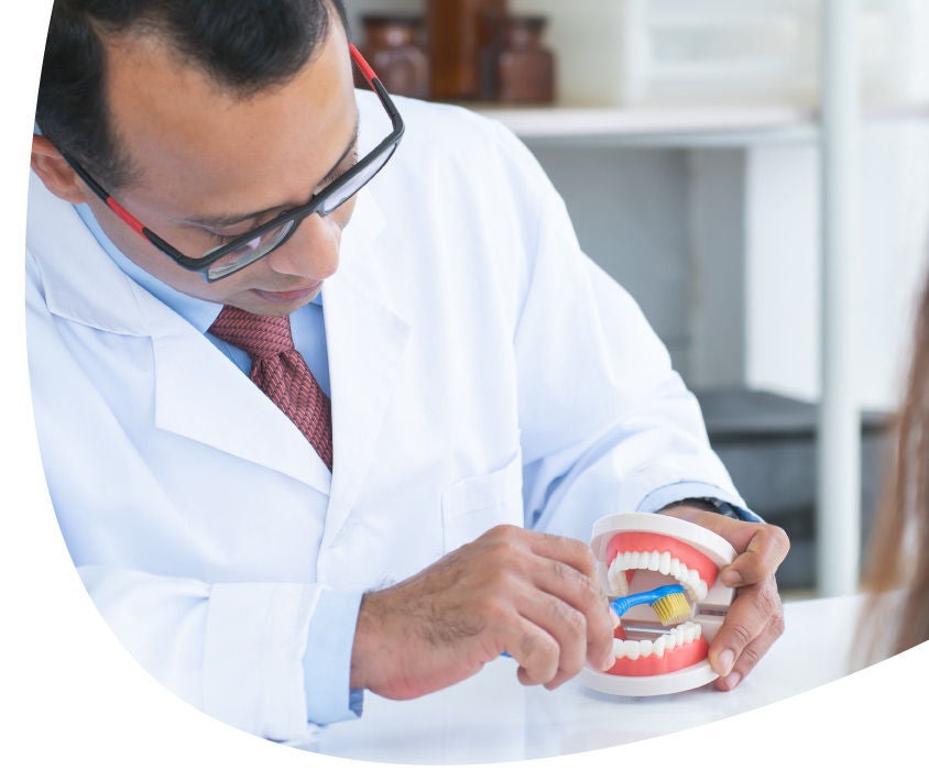 dentist with a student