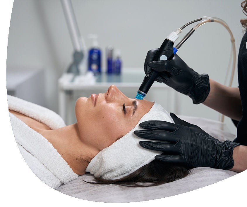 Woman taking cosmetic procedures on her face