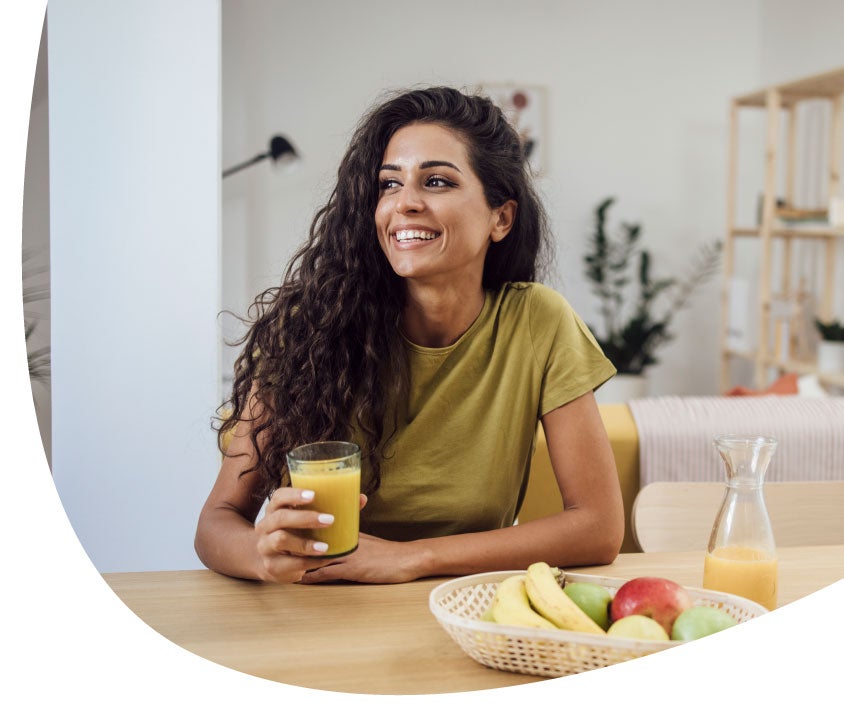 girl with orange juice glass
